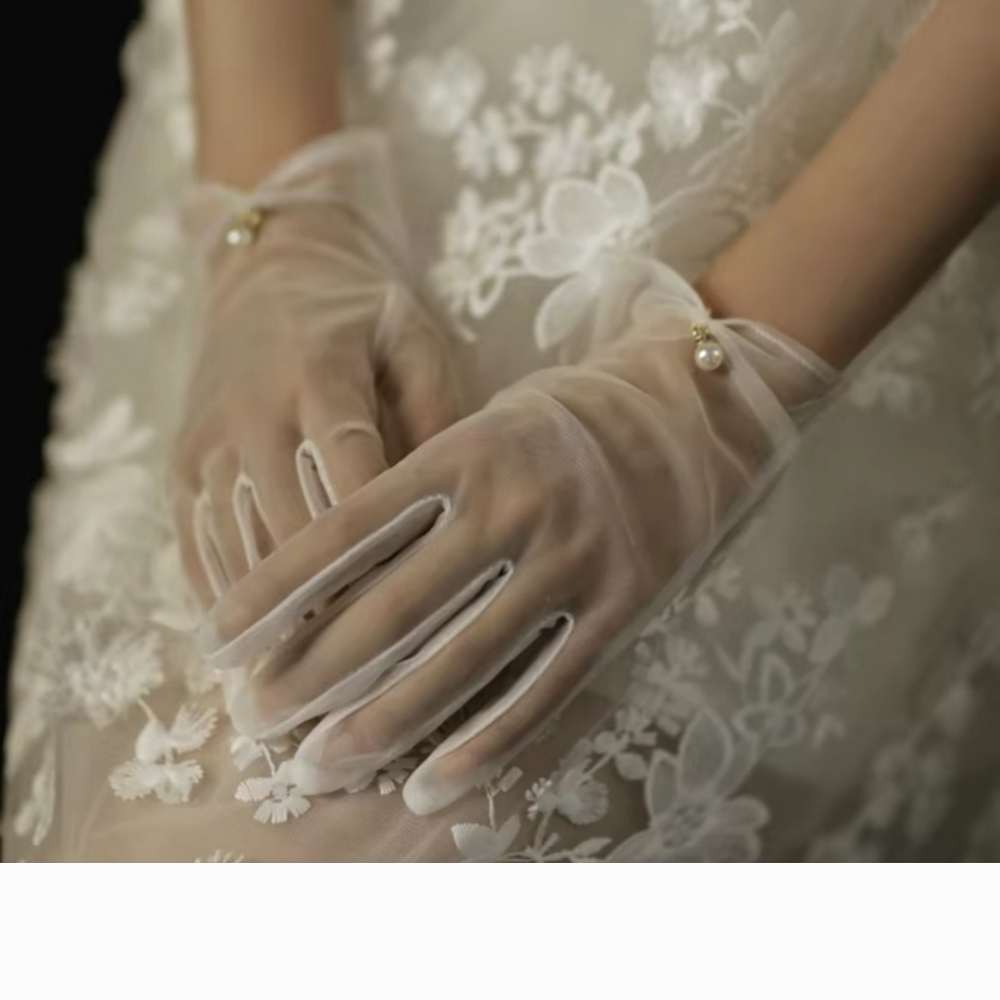 Elegant Sheer White Gloves with Pearl Detail